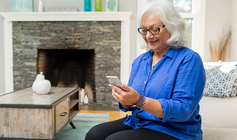 Elderly Woman Using Iphone