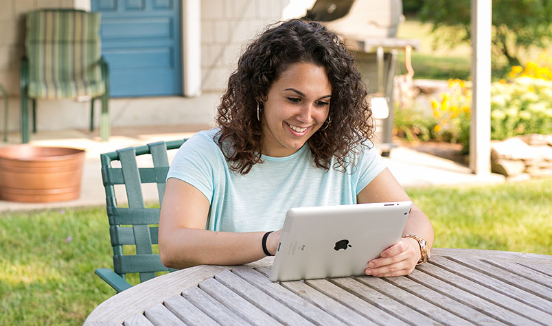 Woman Using Financial Calculators