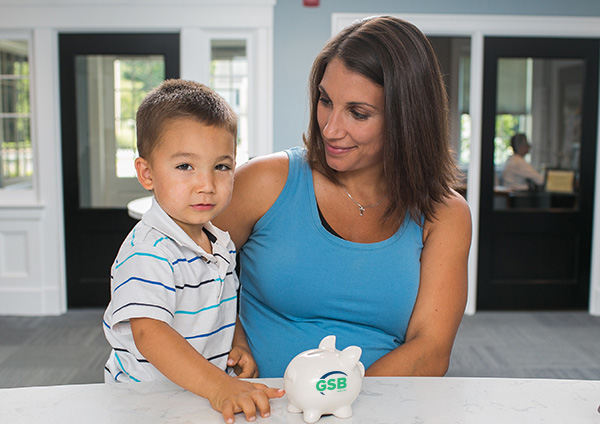 woman with child in GSB bank branch