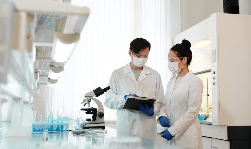 man and woman in research lab