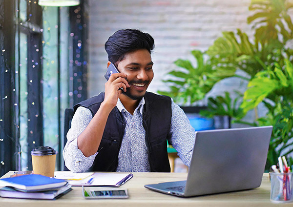 Man talking on phone with GSB support