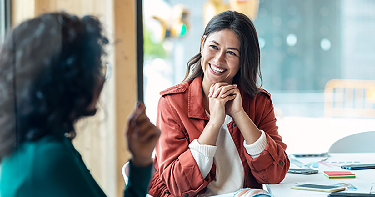 Two businesswomen talking