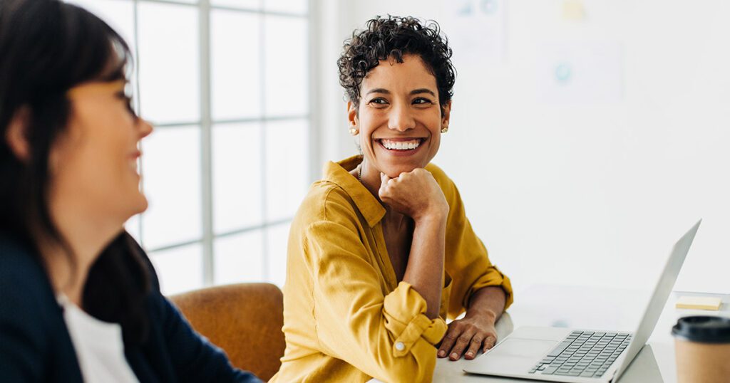 Woman and colleague talking