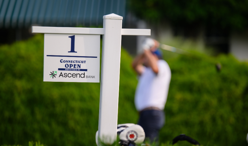 Connecticut Open sign with golfer in the background