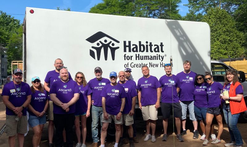 Group of employees at Habitat for Humanity build day.